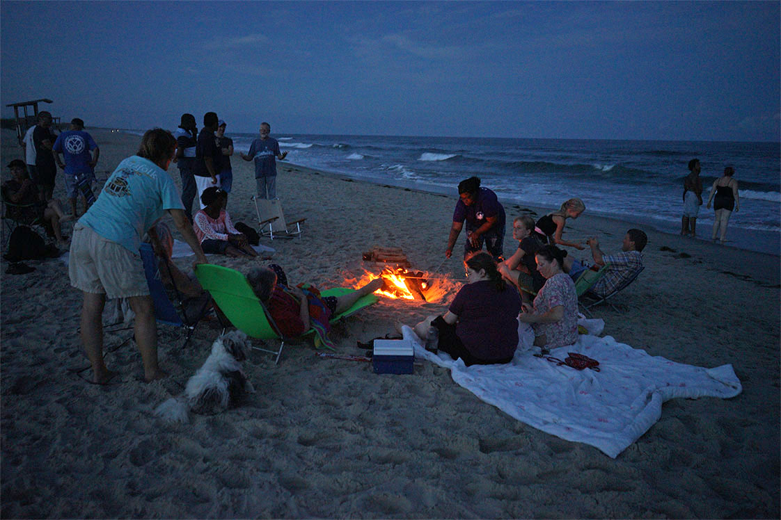 At week's end, after five days "on island," O-Cockers say, the VOICE team enjoys a final bonfire by the Atlantic. (Jock Lauterer photo)