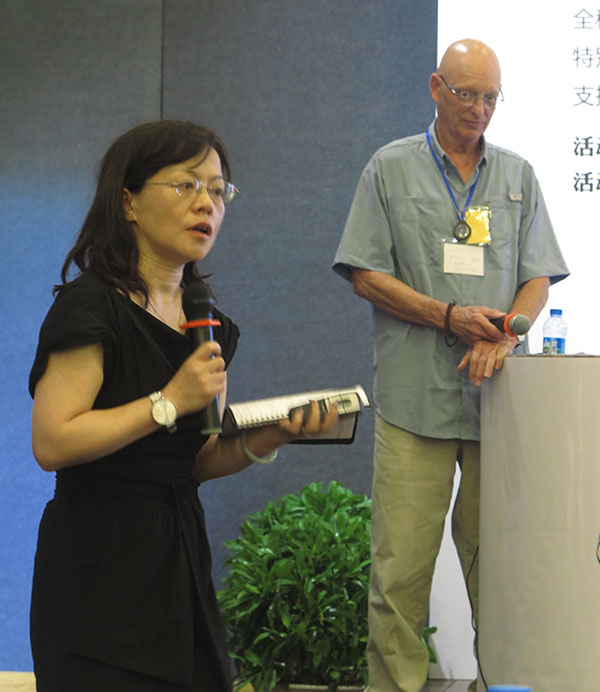 From last year's Community Journalism conference in Shenzhen, Prof. Chen Kai translates for me. (Photo by "Dylan," my other translator)