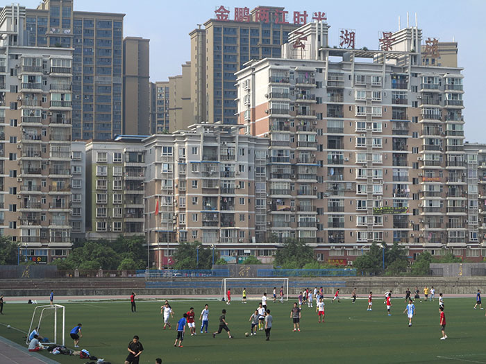 Soccer full swing on a balmy Saturday in Chongqing. (Jock Lauterer photo)
